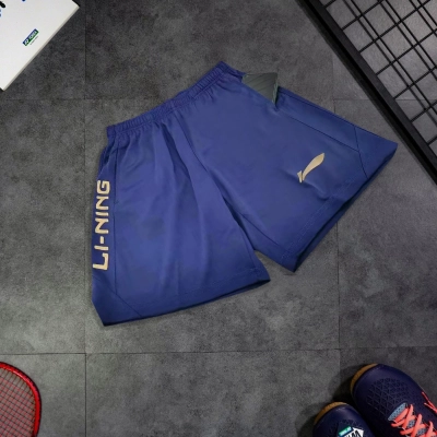 Quần cầu lông Lining AAYN775-5 - Xanh vàng